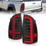ANZO 311427 FITS: 05-15 Toyota Tacoma Full LED Tail Lights w/Light Bar Sequential Black Housing Clear Lens Tail Lights