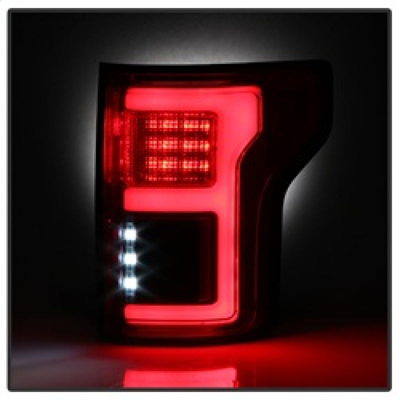 SPYDER 5085320 FITS: 15-18 Ford F-150 LED Tail Lights (w/Blind Spot) Red Clear (ALT-YD-FF15015BS-LBLED-RC) Tail Lights