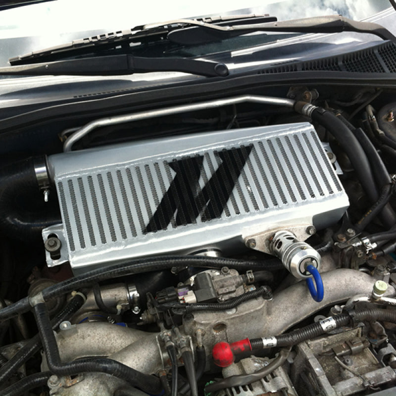 Mishimoto MMTMIC-WRX-01SLBK FITS: Intercoolers FITS: Subaru 02-07 WRX/04-07 STi Top-Mount Intercooler Kit Powder Coated Silver & Black Hoses Intercoolers