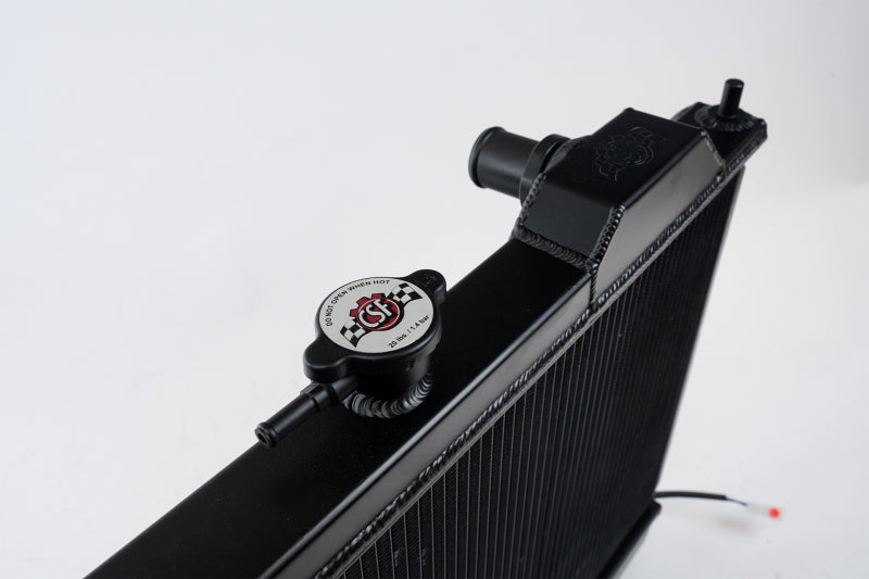CSF 7075B FITS: 96-07 Mitsubishi Evo 4/5/6/7/8/9 Full-Slim Radiator w/12in Fan & Shroud/-16AN Black Radiators