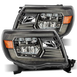 AlphaRex 880733 FITS: 05-11 Toyota Tacoma LUXX Crystal Headlights Plank Style Alpha Black w/Activation Light/DRL Headlights