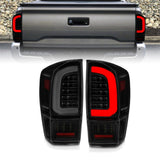 ANZO 311401 FITS: 16-21 Toyota Tacoma LED Tail Lights w/ Light Bar Sequential Black Housing & Smoke Lens Tail Lights