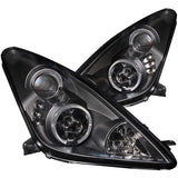 ANZO 121387 FITS: 2000-2005 Toyota Celica Projector Headlights w/ Halo Black Headlights