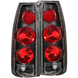 ANZO 211019 FITS: 1999-2000 Cadillac Escalade Taillights Black 3D Style Tail Lights