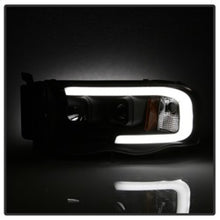 Load image into Gallery viewer, SPYDER 5084606 FITS: 02-05 Dodge Ram 1500 Light Bar Projector Headlights Black (PRO-YD-DR02V2-LB-BK) Headlights