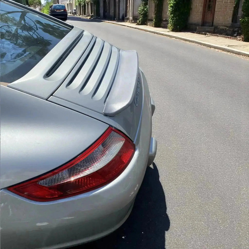 Polyurethane front lip and small wing for Porsche 997.1, 2005–2008, by BetterBodies Motorsport, showcasing aerodynamic upgrade components