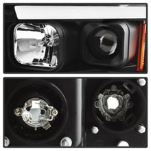Load image into Gallery viewer, SPYDER 5084606 FITS: 02-05 Dodge Ram 1500 Light Bar Projector Headlights Black (PRO-YD-DR02V2-LB-BK) Headlights