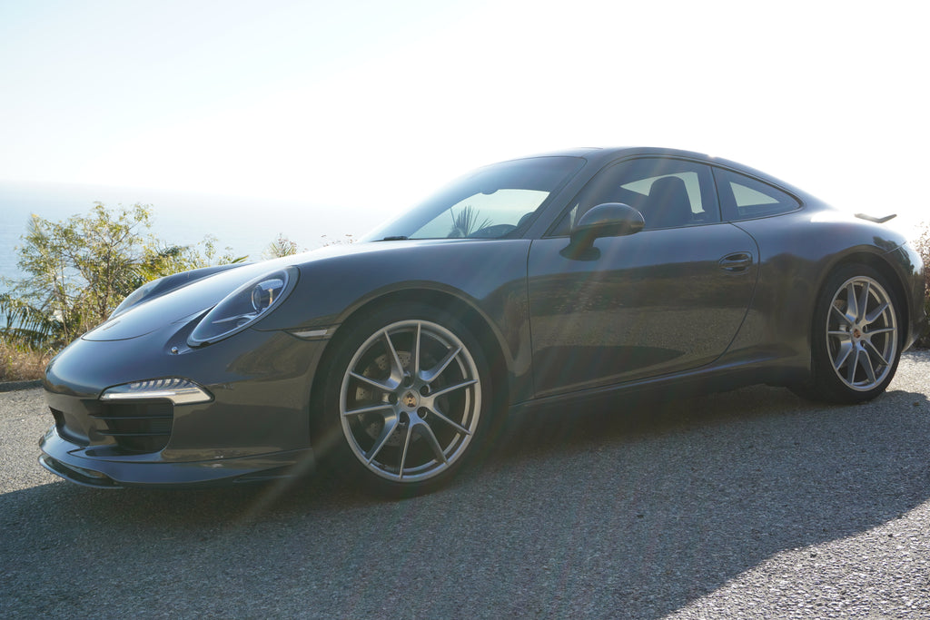Porsche 991 Carrera Euro GT chin spoiler front bumper splitter in polyurethane for 2012–2015, installed on a Porsche 991 Carrera.