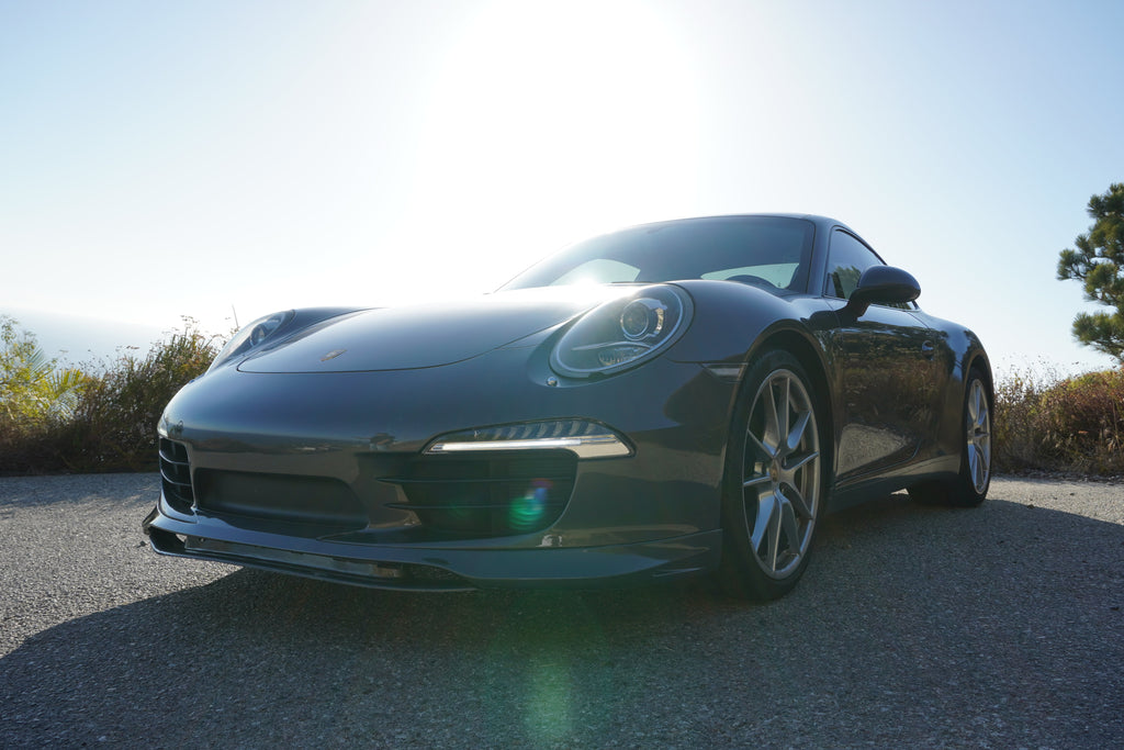 Porsche 991 Carrera Euro GT chin spoiler in polyurethane, front lip splitter for 2012–2015, installed on a Porsche 991 Carrera.