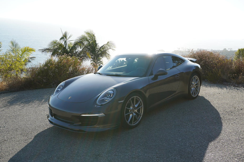 Porsche 991 Carrera Euro GT Chin Spoiler front bumper splitter in polyurethane, installed on a 2012-2015 model, by BetterBodies Motorsport.