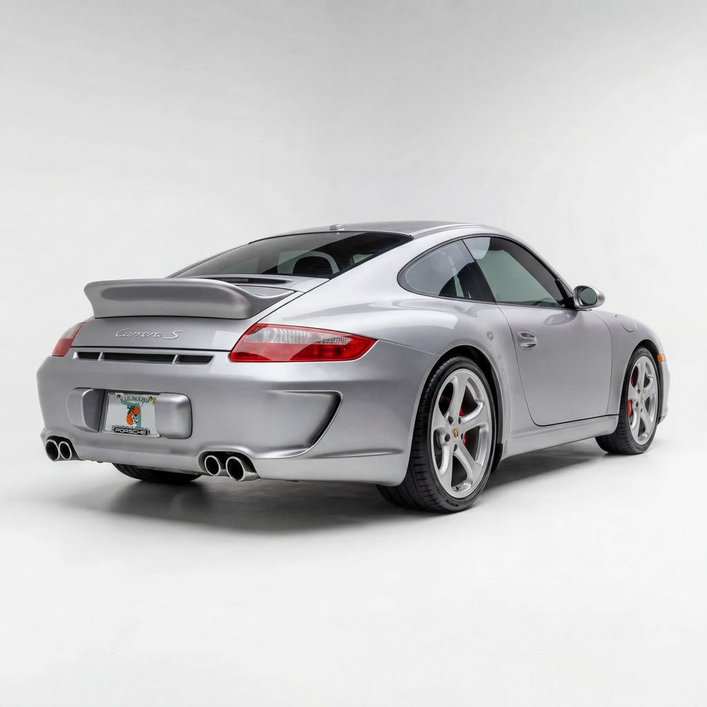 BetterBodies Motorsport Porsche 997.1 Carrera rear bumper in Aero Racing style for 2005–2008 997.1 models, shown in close-up.