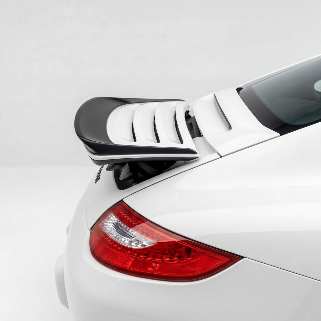 BetterBodies Motorsport Porsche 997 Carrera GT3TEK polyurethane rear wing ducktail spoiler on a sports car.