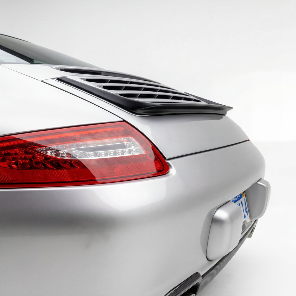 Porsche 997 Carrera GT3TEK polyurethane rear wing spoiler with ducktail design on a sports car, showcasing aerodynamic wing features.