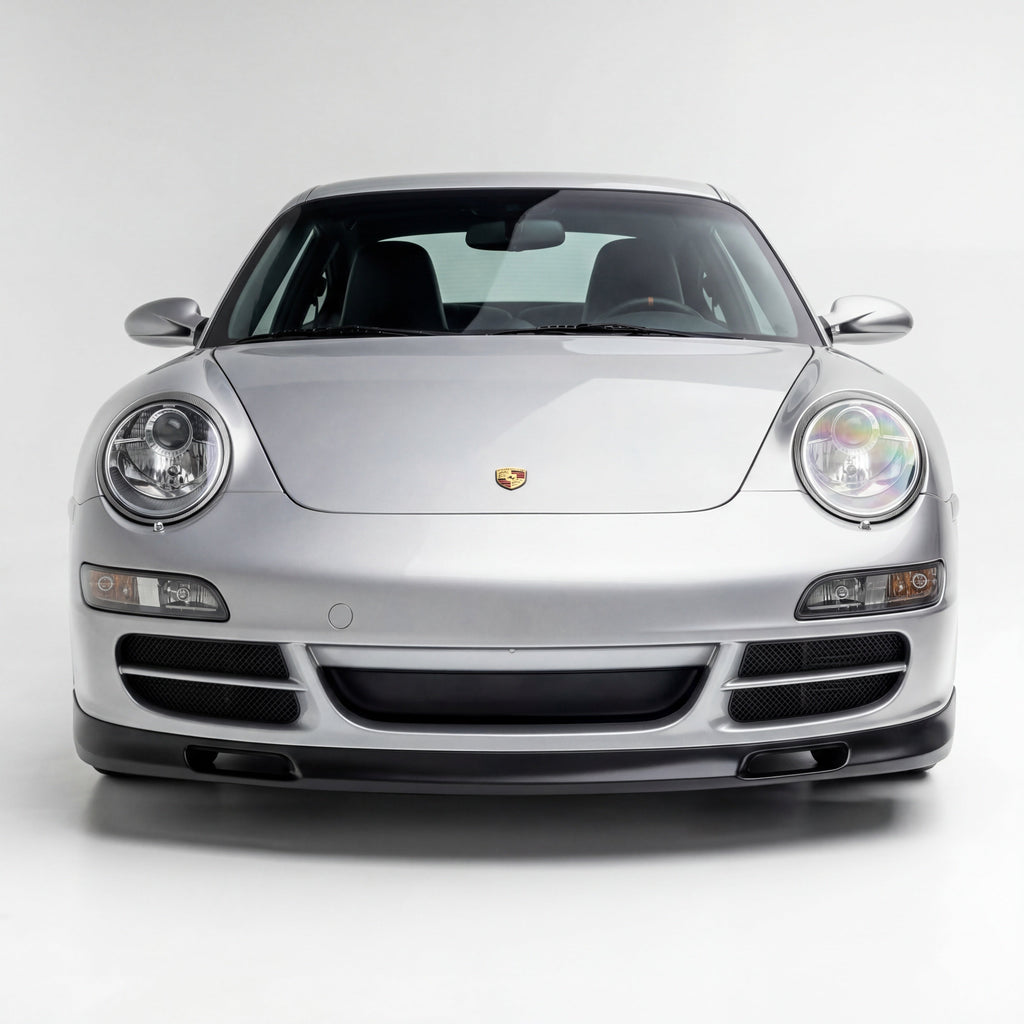 Porsche 997.1 Carrera GT3-style front spoiler lip in polyurethane for 2005-2008, shown on a sports car.