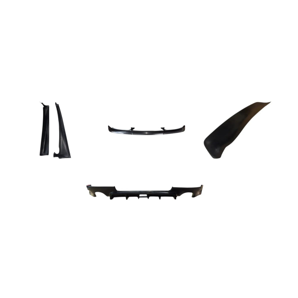 BetterBodies Motorsport Porsche 996 Aero Kit includes front lip, side rockers, small ducktail, and rear diffuser on a car.
