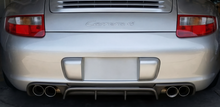 Load image into Gallery viewer, BetterBodies Motorsport Porsche 997.1 rear bumper diffuser in RUF TA-style polyurethane for 2005–2008 models.
