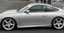 Load image into Gallery viewer, BetterBodies Motorsport polyurethane Porsche 996.1 Aero II front lip and GT3 RS side skirts kit for 1999–2001 models.