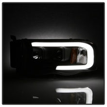 Load image into Gallery viewer, SPYDER 5084606 FITS: 02-05 Dodge Ram 1500 Light Bar Projector Headlights Black (PRO-YD-DR02V2-LB-BK) Headlights