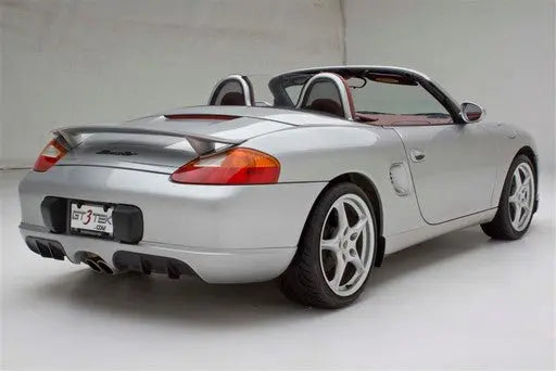BetterBodies Motorsport polyurethane rear diffuser for Porsche Boxster 1997–2004, aerodynamic upgrade with sleek design and precision fit.