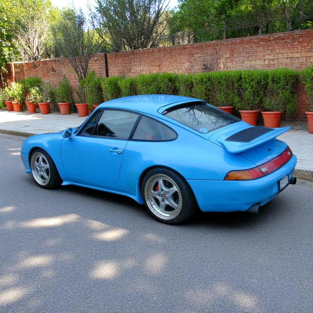 BetterBodies Motorsport polyurethane side rockers and front splitters for Porsche 993 1995-1998, enhancing aerodynamics and style.