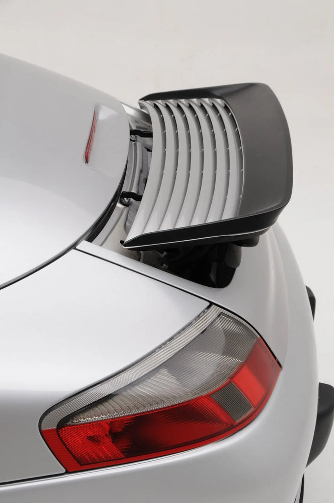 Porsche 996 Carrera small wing spoiler by BetterBodies Motorsport, polyurethane aero upgrade for 1999-2004 models, mounted on car.