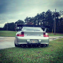 Load image into Gallery viewer, BetterBodies Motorsport Porsche 997.1 Carrera rear bumper diffuser in RUF TA-style polyurethane, fits 2005–2008 models.