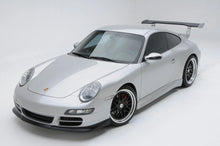 Load image into Gallery viewer, BetterBodies Motorsport Porsche 997 Carrera narrow body side rockers and polyurethane aero skirts installed on a 2005–2011 model.
