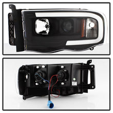 Load image into Gallery viewer, SPYDER 5084606 FITS: 02-05 Dodge Ram 1500 Light Bar Projector Headlights Black (PRO-YD-DR02V2-LB-BK) Headlights