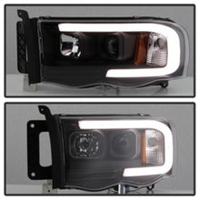 Load image into Gallery viewer, SPYDER 5084606 FITS: 02-05 Dodge Ram 1500 Light Bar Projector Headlights Black (PRO-YD-DR02V2-LB-BK) Headlights