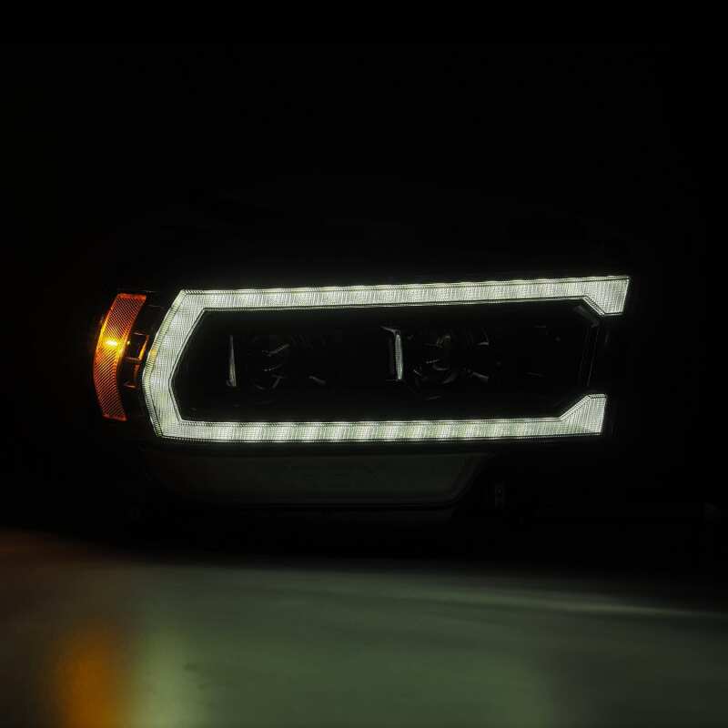 AlphaRex 880549 FITS: 19-21 Ram 2500 LUXX LED Proj Headlights Plank Style Alpha Blk w/Activ Light/Seq Signal/DRL Headlights