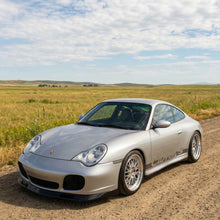 Load image into Gallery viewer, Silver Porsche 996 Turbo front lip spoiler by BetterBodies Motorsport, racing style upgrade for enhanced front bumper appearance.