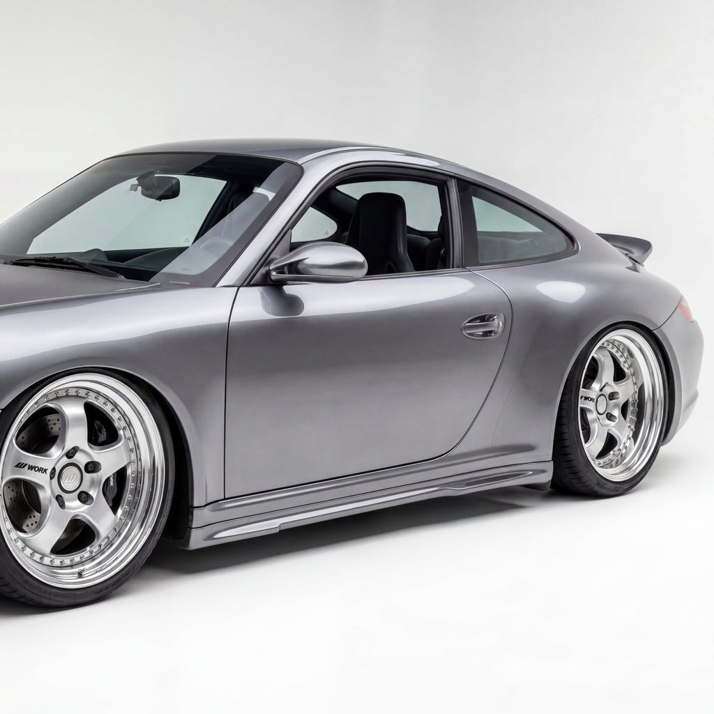 Silver 997 Carrera Mach II side skirts for narrow body Carrera, made of durable polyurethane by BetterBodies Motorsport.