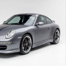 Load image into Gallery viewer, Porsche 997 Carrera narrow body side rockers by BetterBodies Motorsport featuring polyurethane aero skirts, installed on a 2005–2011 model.