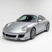Load image into Gallery viewer, Porsche 997.2 front lip spoiler in polyurethane GT3-style for 2009–2012, installed on the front of the car, with no license plate visible.