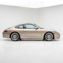 Load image into Gallery viewer, Polyurethane Porsche 996 GT3-style front spoiler lip by BetterBodies Motorsport for 1998-2001 911 models, shown on a vehicle.