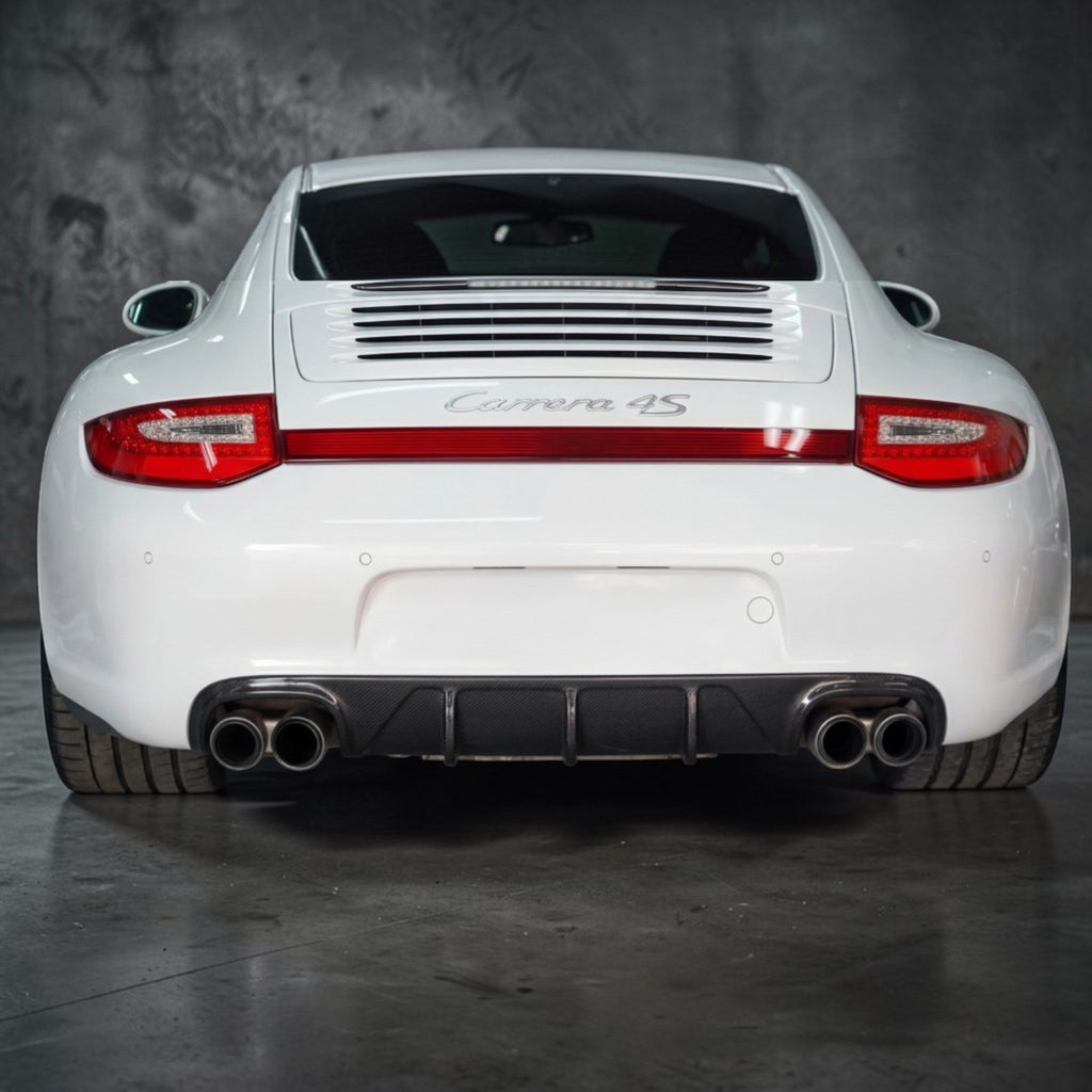 Porsche 997.2 rear bumper diffuser in RUF/TA style polyurethane with detailed fins, designed for 2009–2012 models.