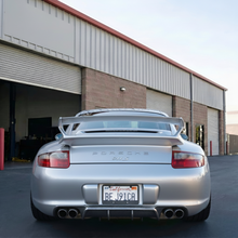 Load image into Gallery viewer, Porsche 997.1 rear bumper diffuser in RUF TA-style polyurethane, designed for 2005–2008 models, by BetterBodies Motorsport