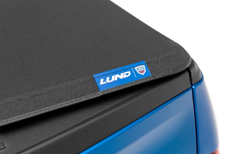 LUND 95850 -Lund 99-17 Ford F-250 Super Duty (6.5ft. Bed) Genesis Elite Tri-Fold Tonneau Cover - Black